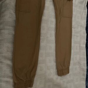 Men Brown Mustard Cargo Long Pants. Size S.